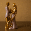Golden Embrace Ceramic Couple Figurine